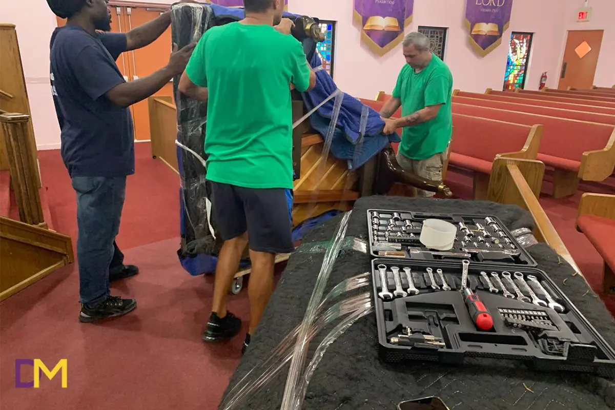Team Members Prepare Piano for Moving Doral Movers Team Members Prepare Piano for Moving