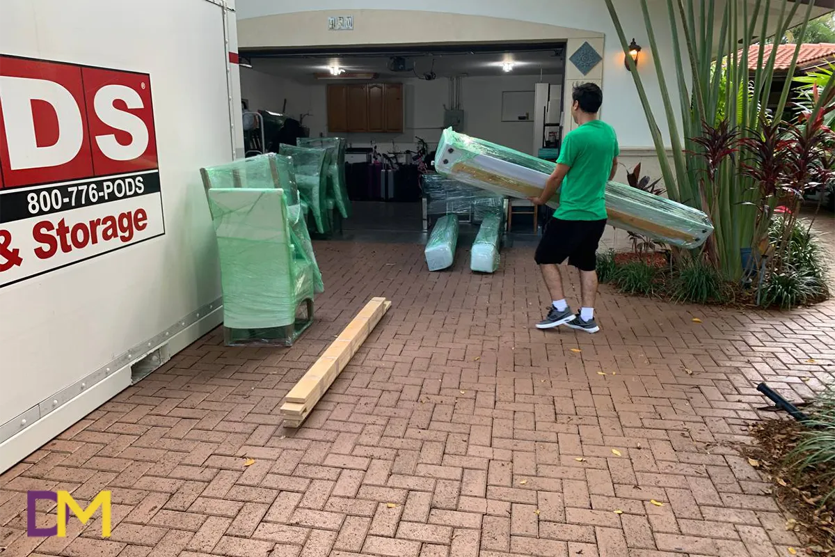 Team Member Loading Packed Furniture Doral Moving Team Member Loading Packed Furniture